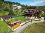 Novostavba zrubového rodinného  domu v Oščadnici