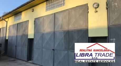 Prenájom - skladové priestory s veľkými garážovými bránami v Komárne