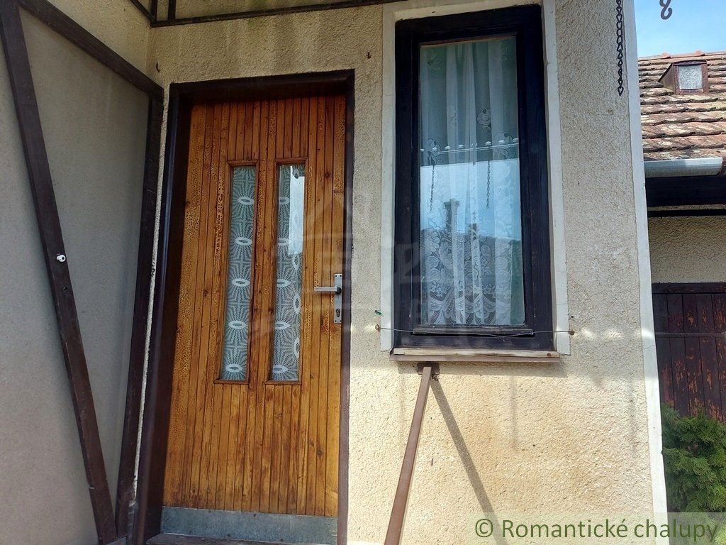 Ihneď obývateľný poschodový dom so suterénom v obci Mužla blízko Štúrova
