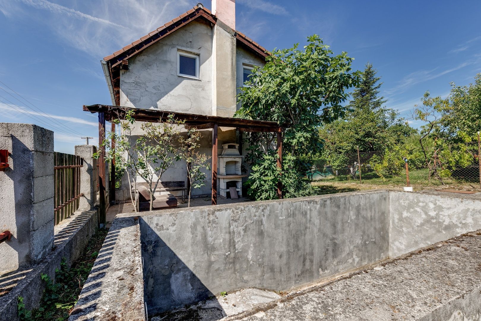 PREDAJ - Rekreačný dom s možnosťou celoročného bývania v lokalite Stupava, okres Malacky, konkrétne v záhradkárskej osade Lintávy