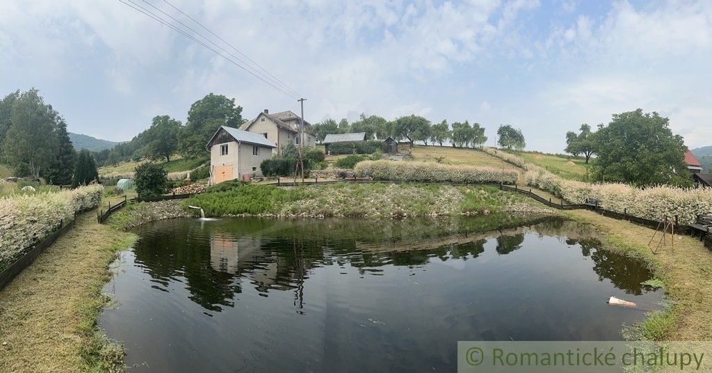 Dom na polosamote s rybníkom 5712m2. Znížená cena.