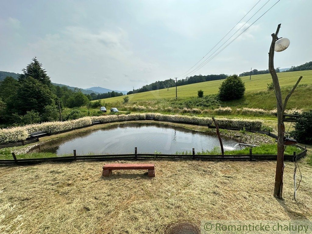 Dom na polosamote s rybníkom 5712m2. Znížená cena.