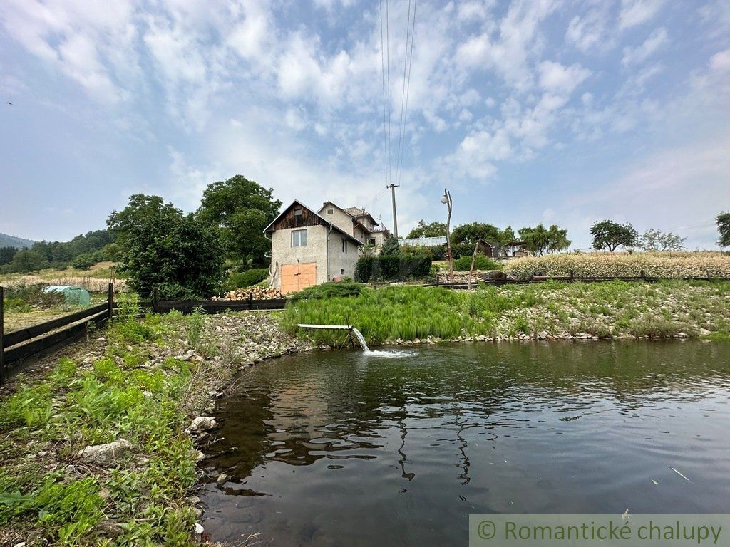 Dom na polosamote s rybníkom 5712m2. Znížená cena.